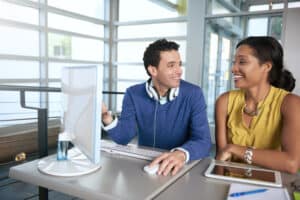 two employees collaborating at work