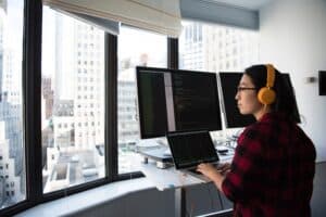 person working in web development with code on their computer