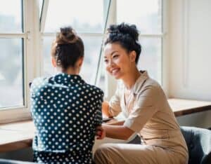 A picture of two people in an informational interview